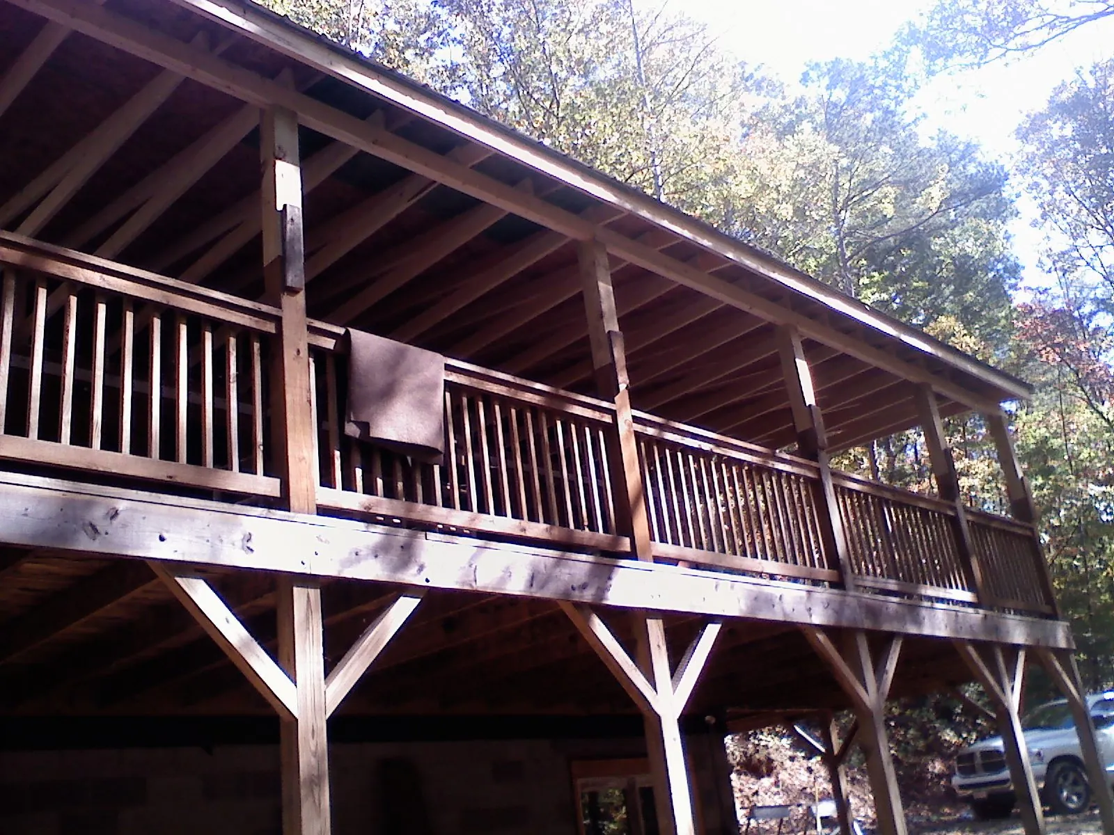 Timber framing under a new elevated porch and deck — Roof Leak Repair in Iota by Roofing Brothers